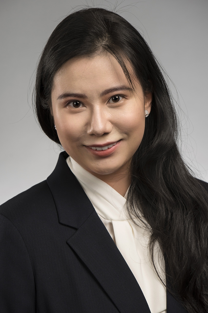 Medical residency headshot in a dark blazer